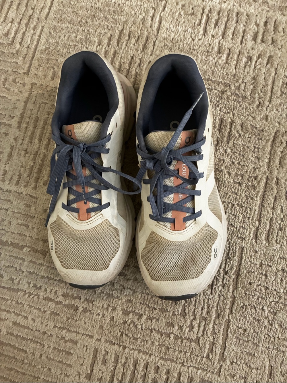 On Running women’s Sneakers in Cream with Navy and Rust Accents